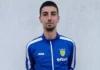 24377
