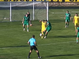 yellow and green clash near goal.l